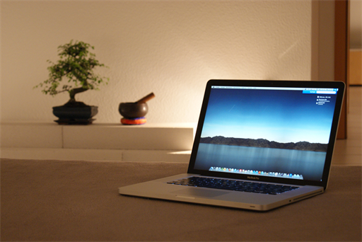 Bed and MacBook
