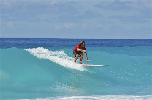 Riding the surf.